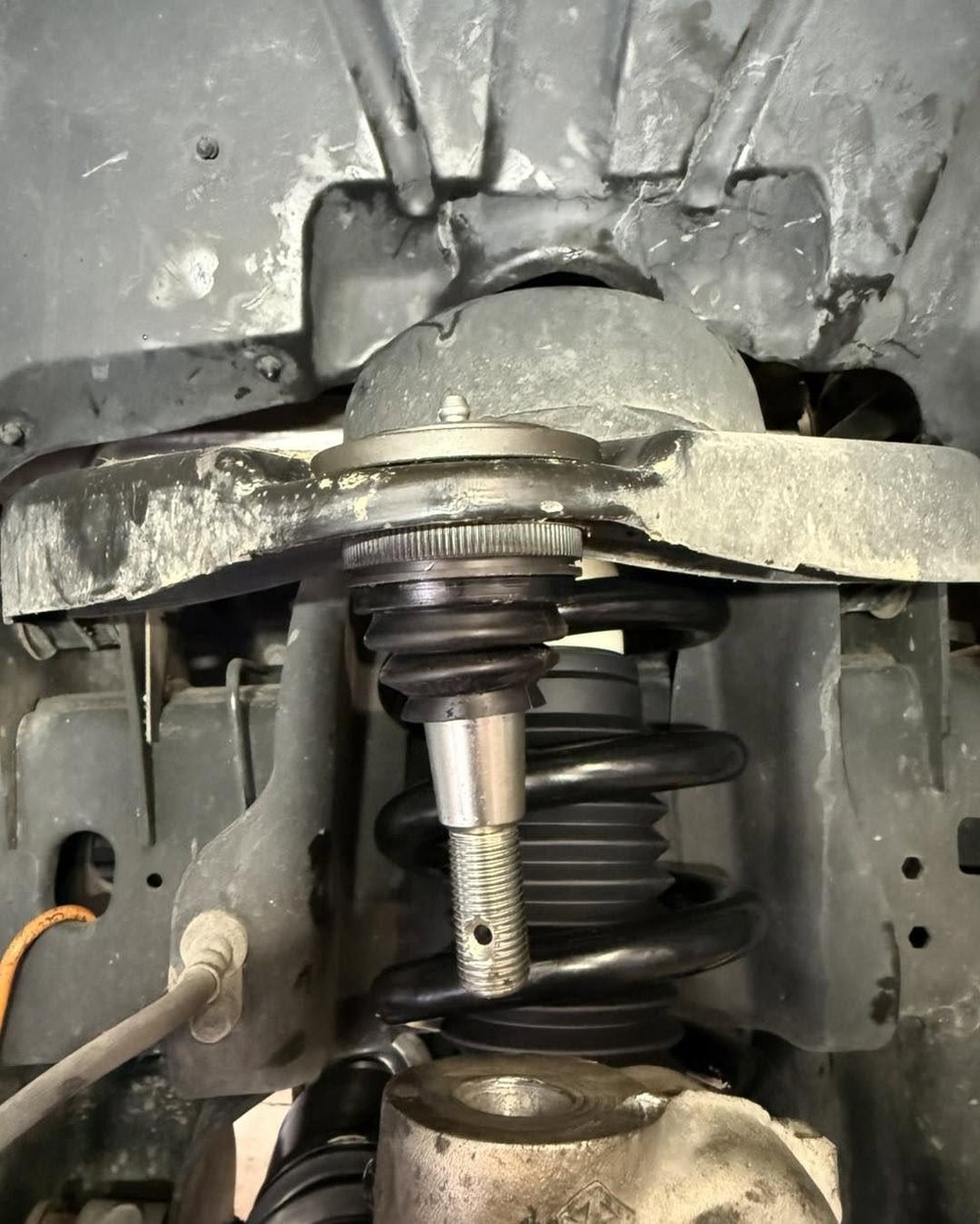 New ball joint with a fresh boot installed